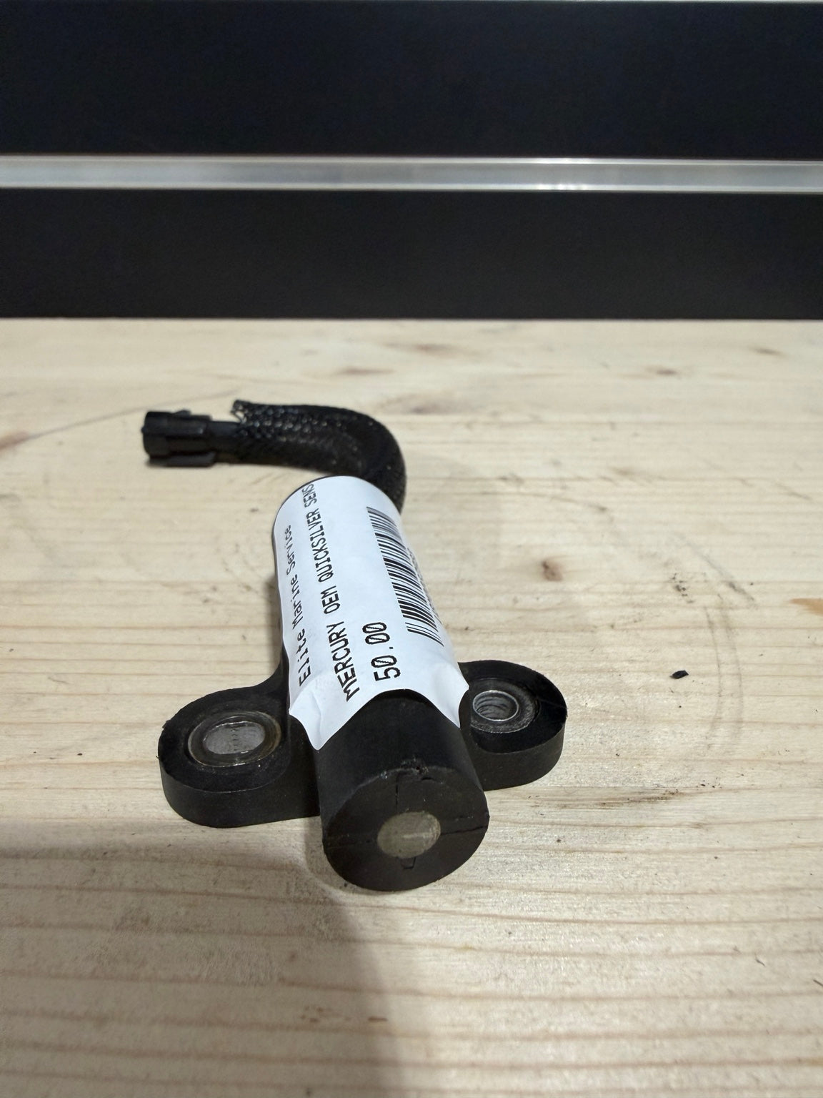 Used Mercury crankshaft position sensor 8M0082988 — actual item tip and label view