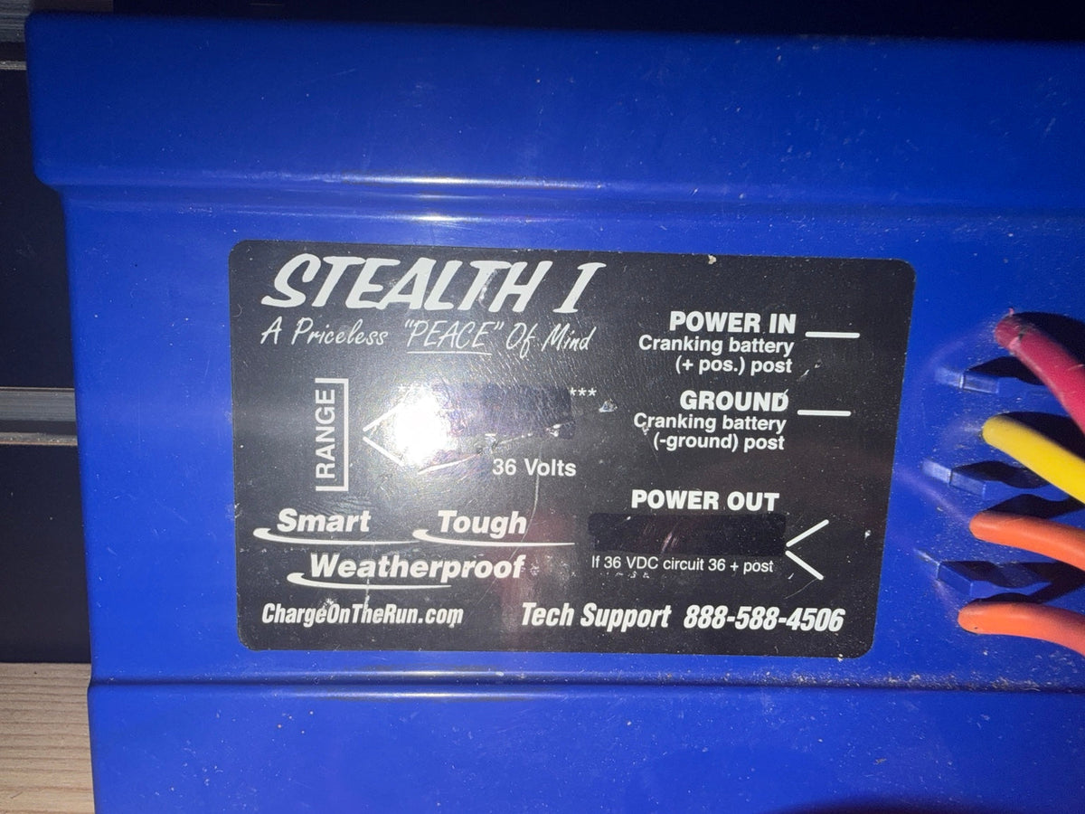 Stealth I charger label showing 36 volts and connection markings
